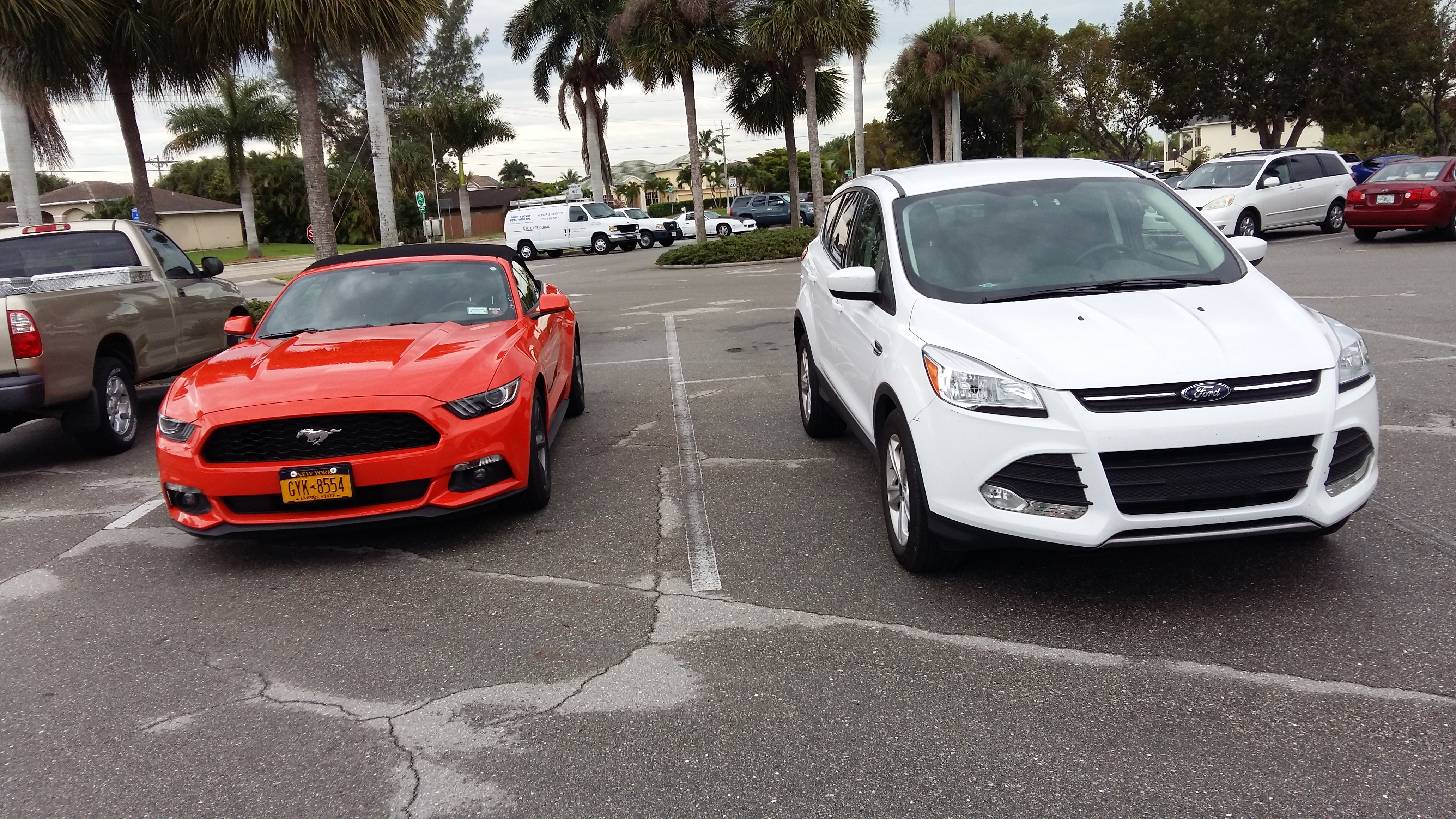 picture of 2 american cars.